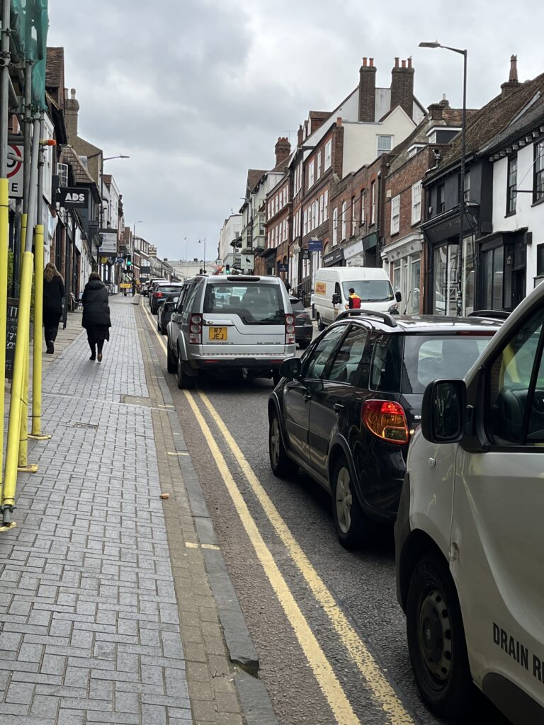 Traffic queuing on Holywell Hill.