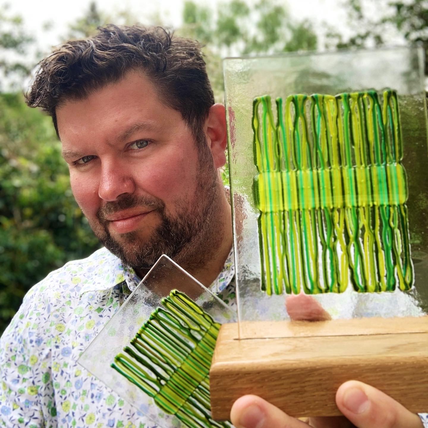 Lee Wood and one of the Ember eco-champion awards.