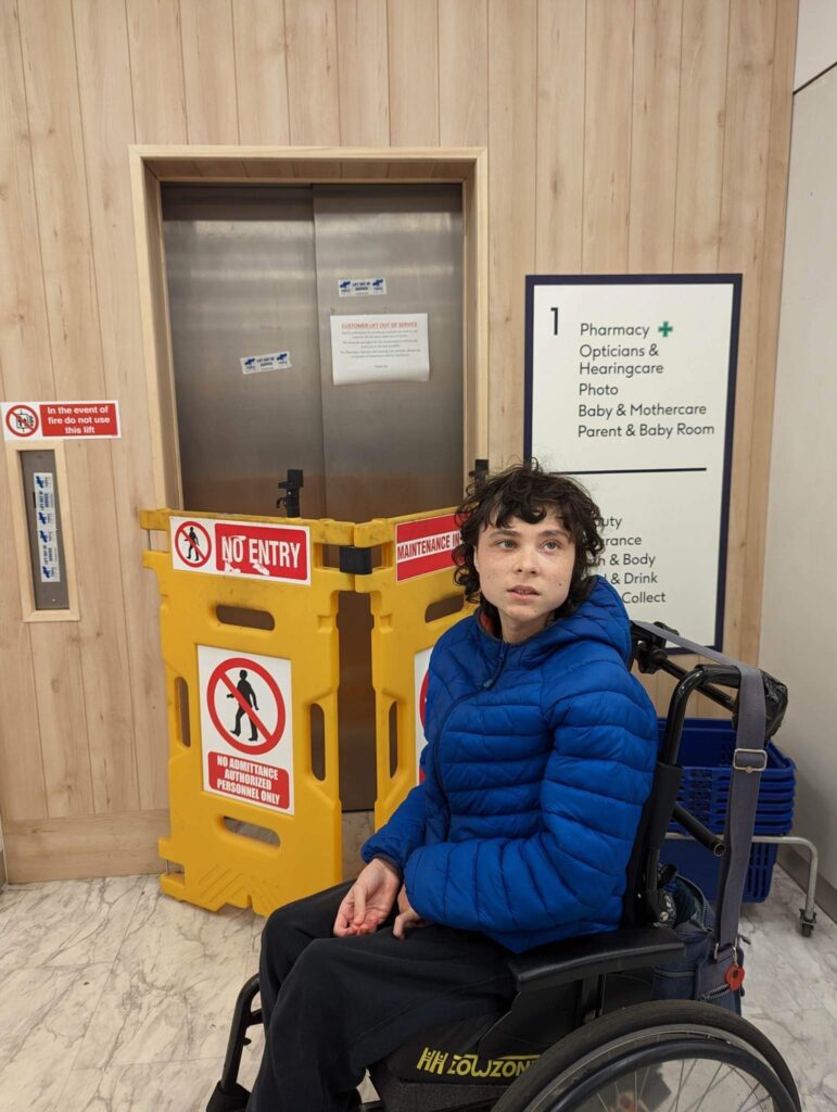 Ben Boulter outside Boots' broken lift.