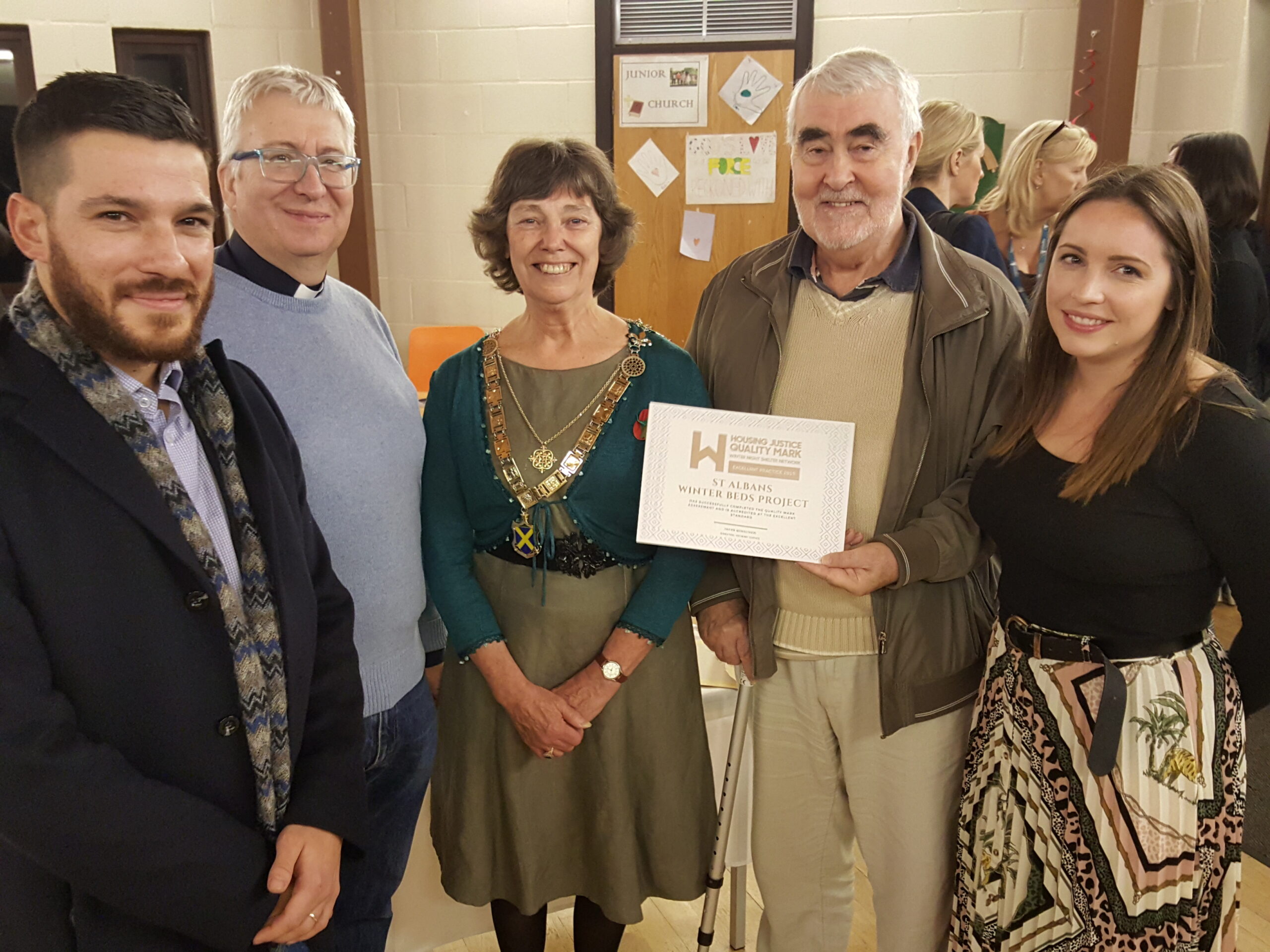 The Open Door team collect the Housing Justice Award for the Winter Beds Project.