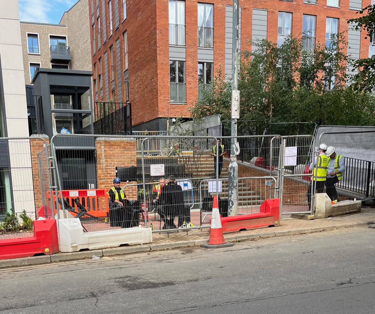 Workmen taking a break at Jubilee Square.