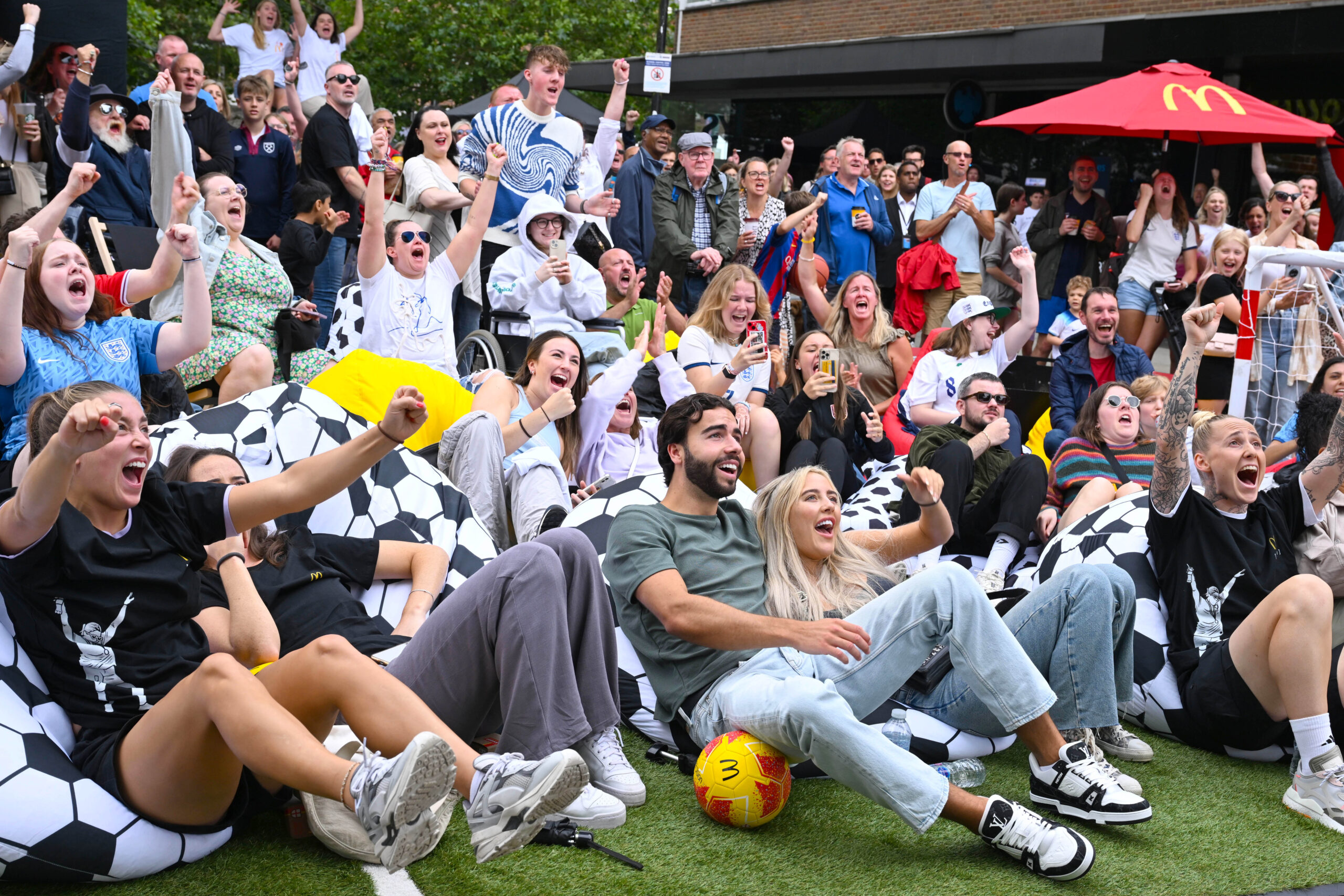Love Island winners Jess Harding and Sammy attend a screening in St. Albans of the England vs. Columbia quarter final match. Photo: Jeff Spicer/PA Wire.