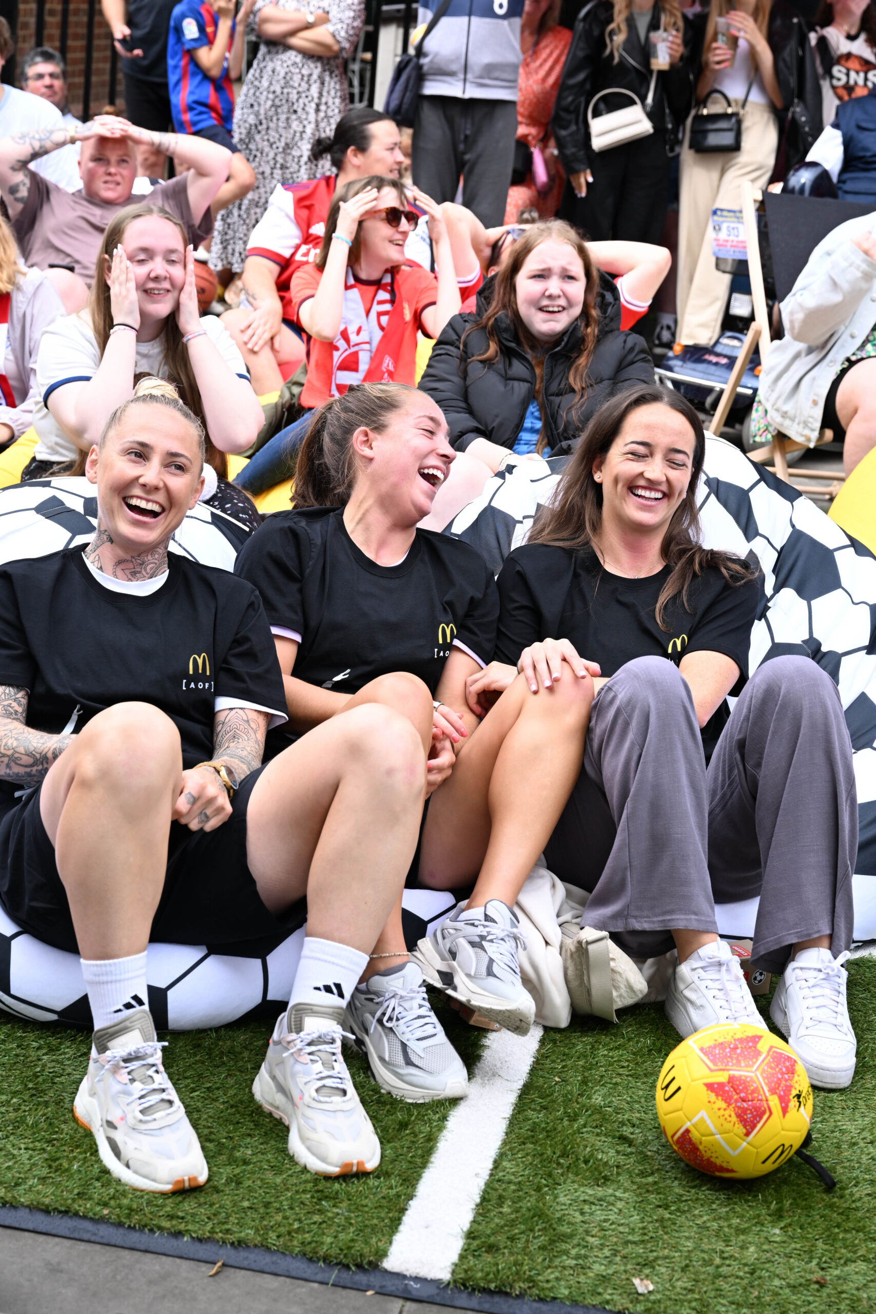 Footballers Leah Galton, Maya Le Tissier and Anna Patten and attend a screening in St. Albans of the England vs. Columbia quarter final match of the FIFA Women's World Cup hosted by McDonald's. Photo: Jeff Spicer/PA Wire.