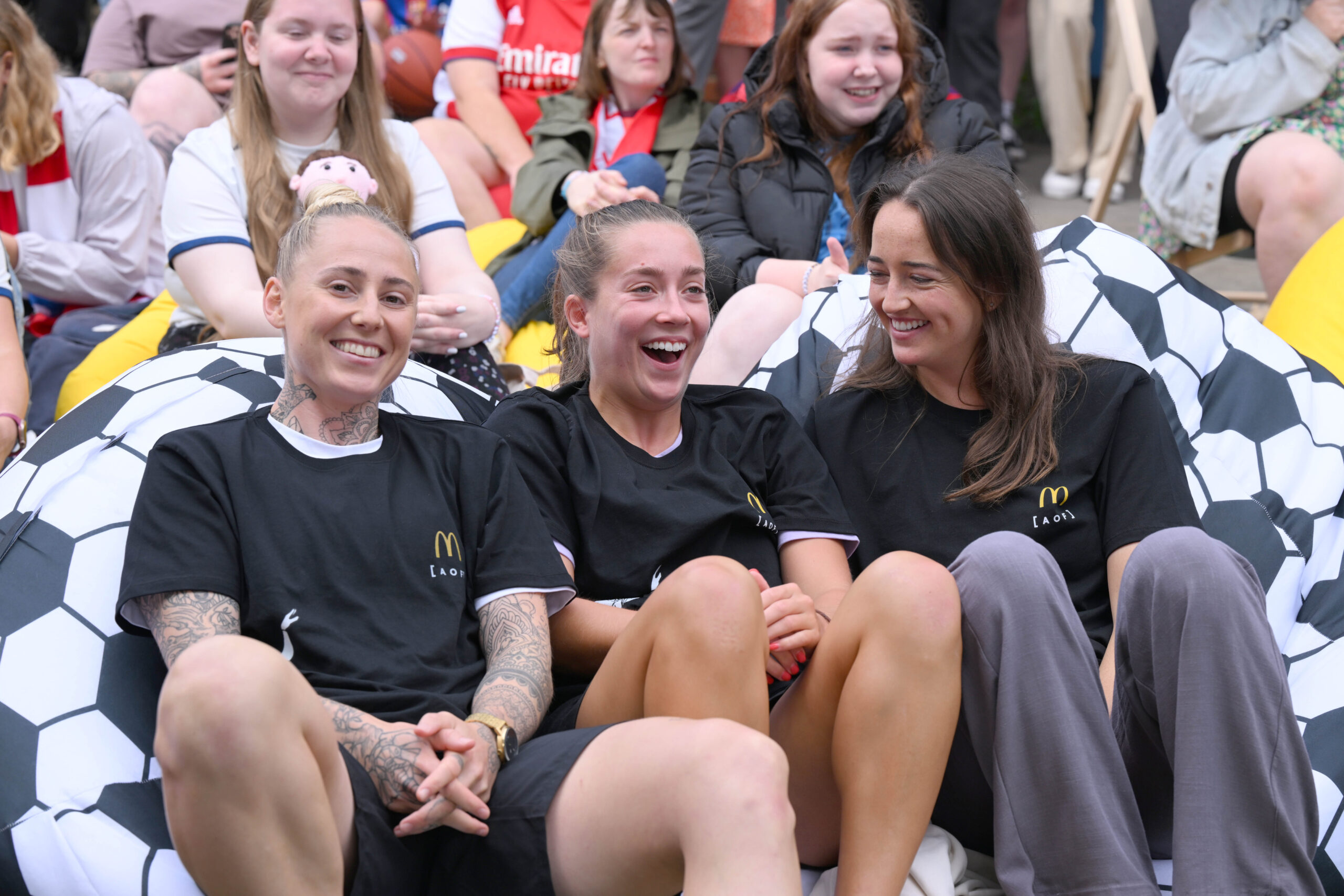 Footballers Leah Galton, Maya Le Tissier and Anna Patten and attend a screening in St. Albans of the England vs. Columbia quarter final match of the FIFA Women's World Cup hosted by McDonald's. Photo: Jeff Spicer/PA Wire.