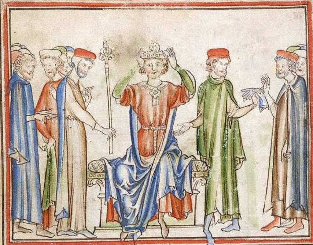 King Harold Il places the crown on his own head. (Cambridge University Library).