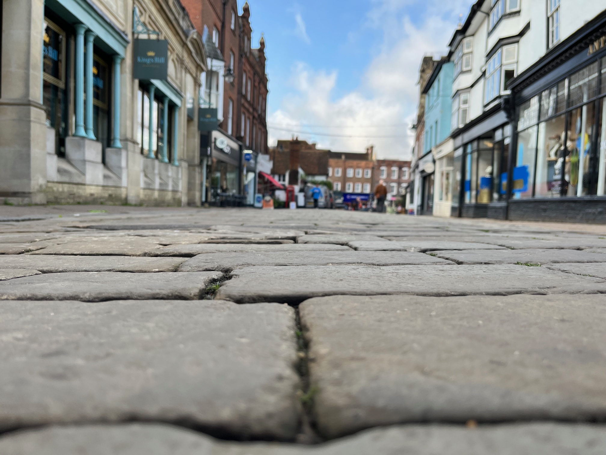 The poor state of the surface in Market Place.
