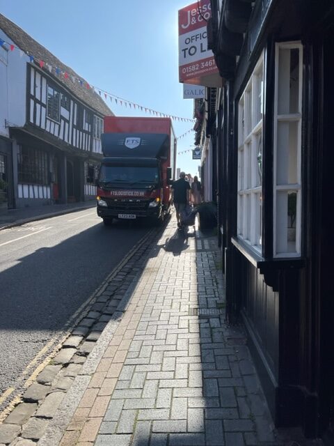 Two-way traffic poses a danger in George Street, and a lack of communal bin stores means containers blocking the footpath.