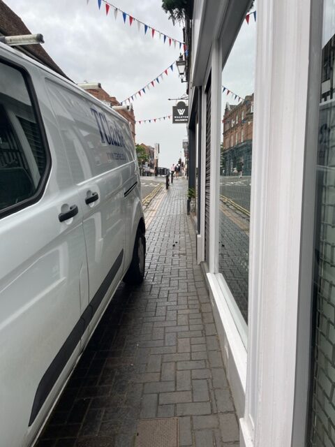 Two-way traffic poses a danger in George Street, and a lack of communal bin stores means containers blocking the footpath.