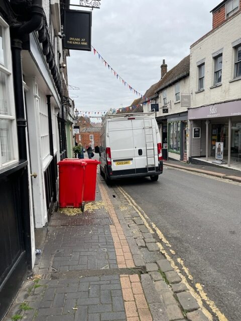 Two-way traffic poses a danger in George Street, and a lack of communal bin stores means containers blocking the footpath.