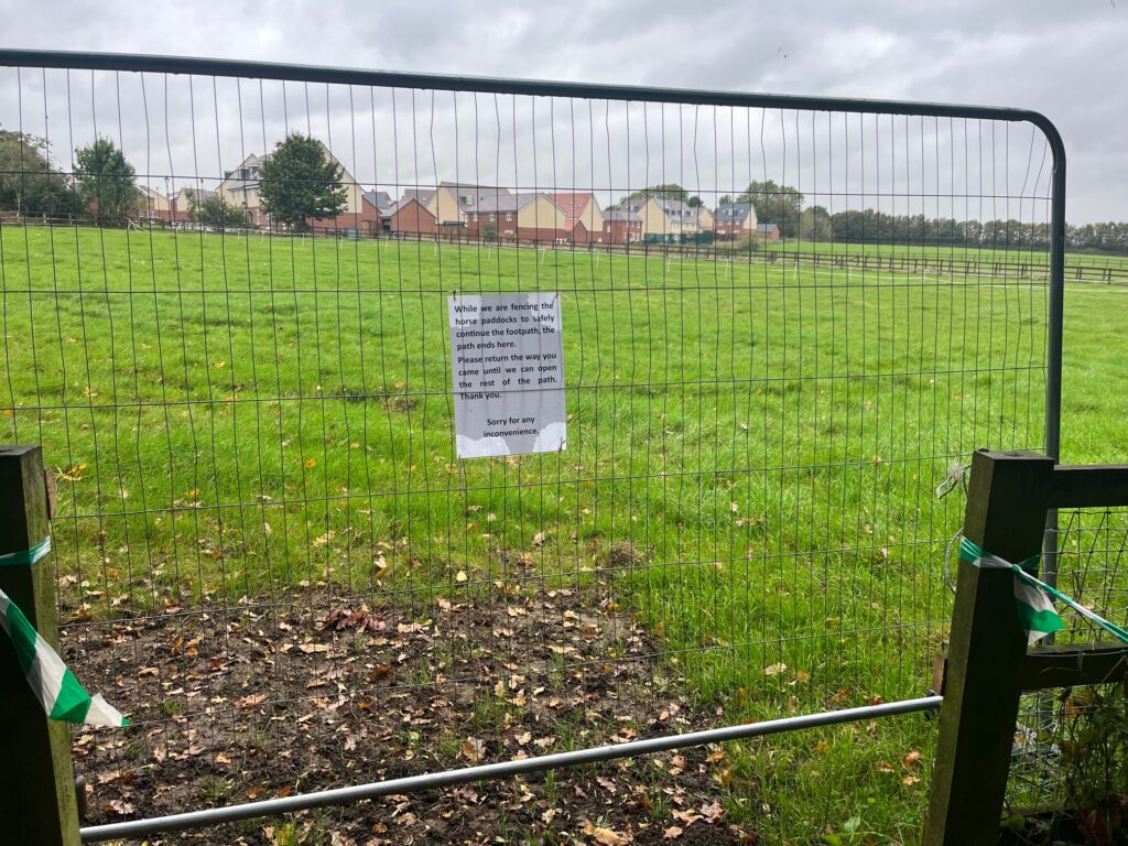 A fence blocks further progression down the alternative footpath.