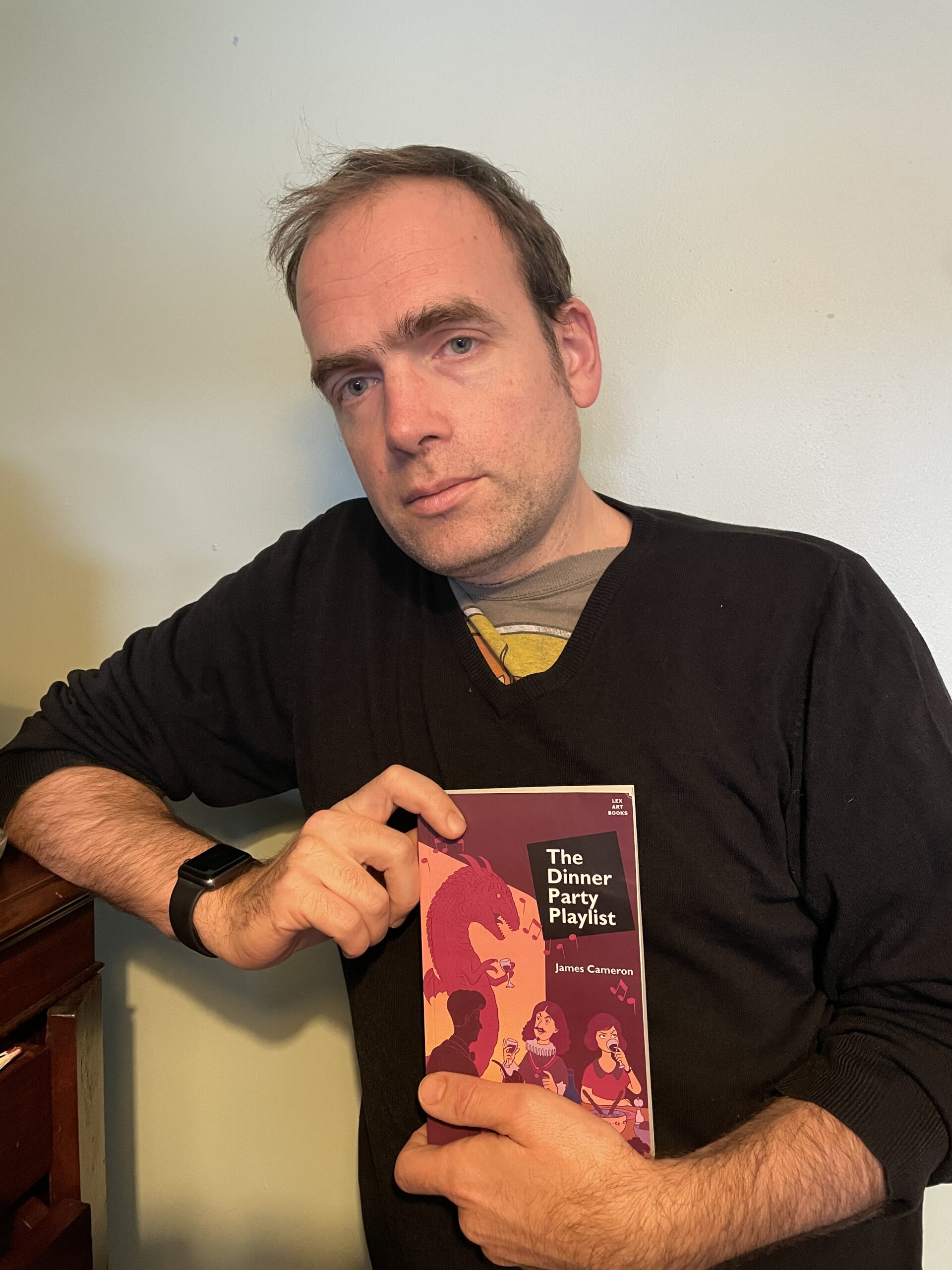 James Cameron with his new book The Dinner Party Playlist.