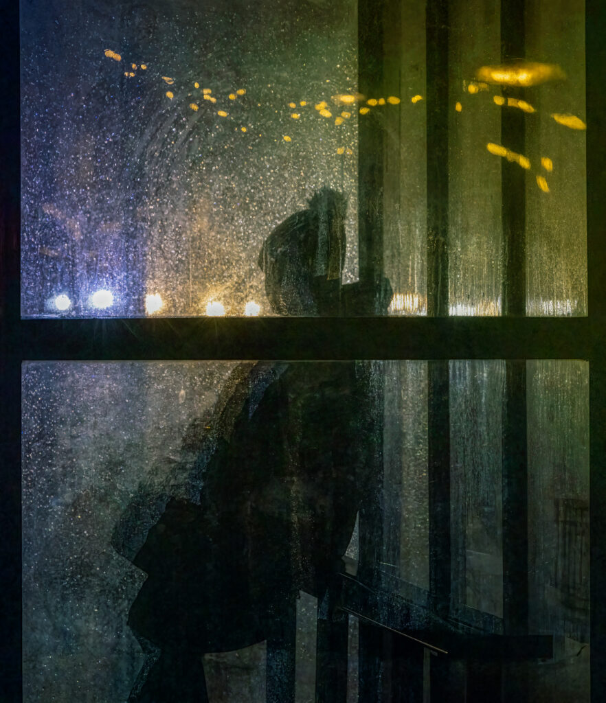 Rainy Night Bus Stop by Steve Collins