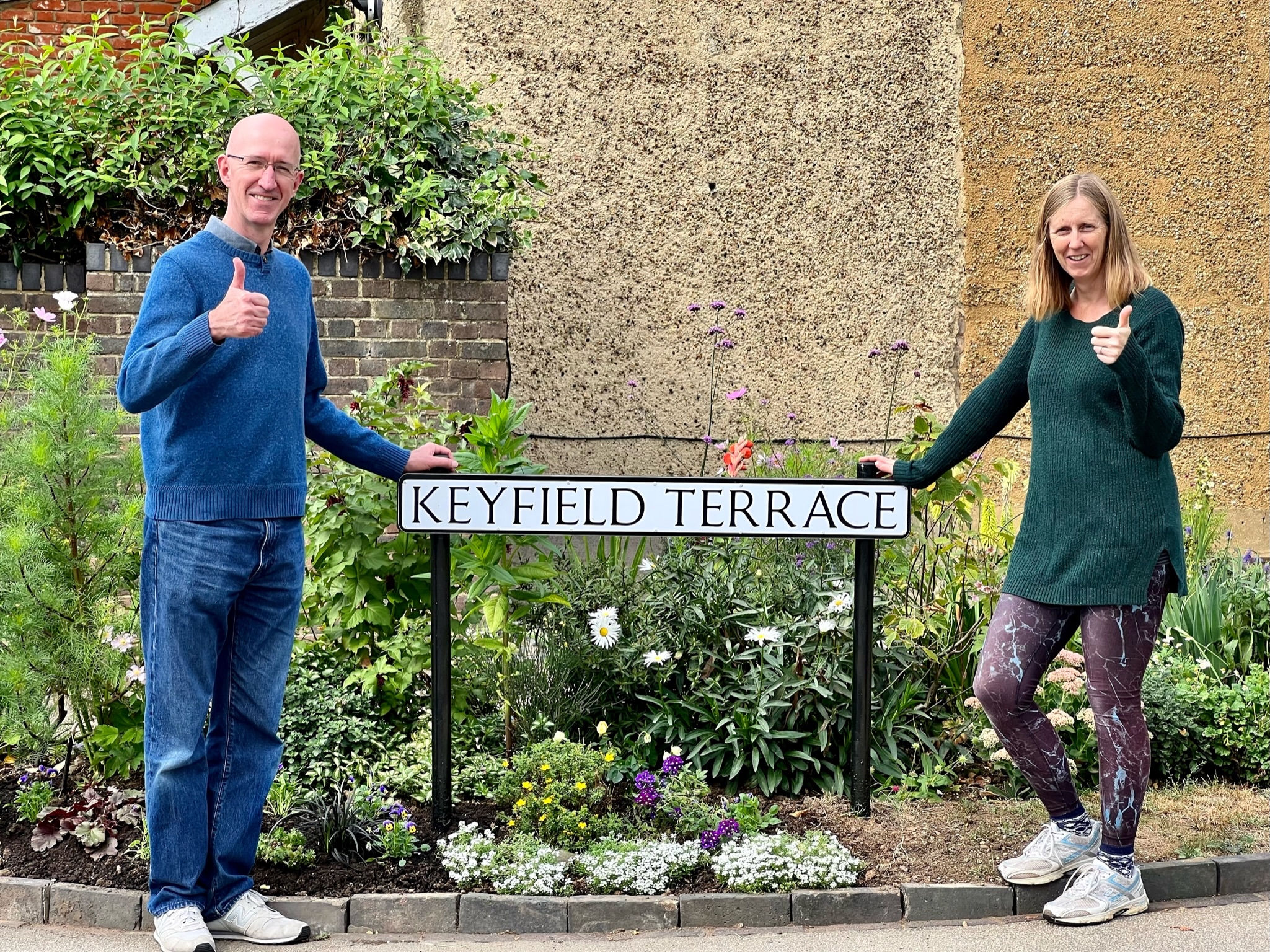Green councillors Juliet Voisey and Simon Grover of St Peter's ward, by the flower bed created by Erica and Philip Lynwood and other residents in Keyfield Terrace. Credit: Matt Fisher