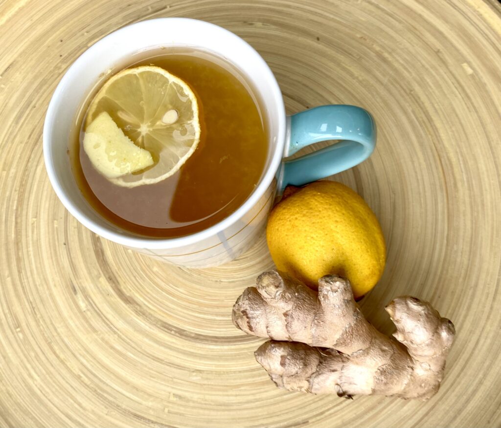 Lemon and ginger infusion broth.
