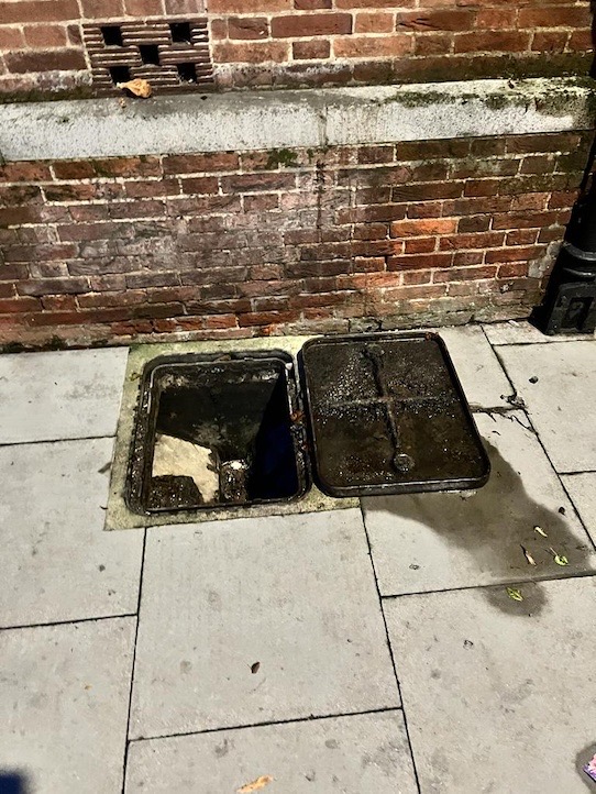 This manhole cover bursts when there is heavy rainfall.