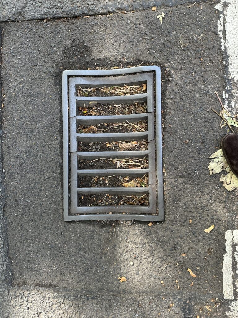 The blocked drain in Station Road.