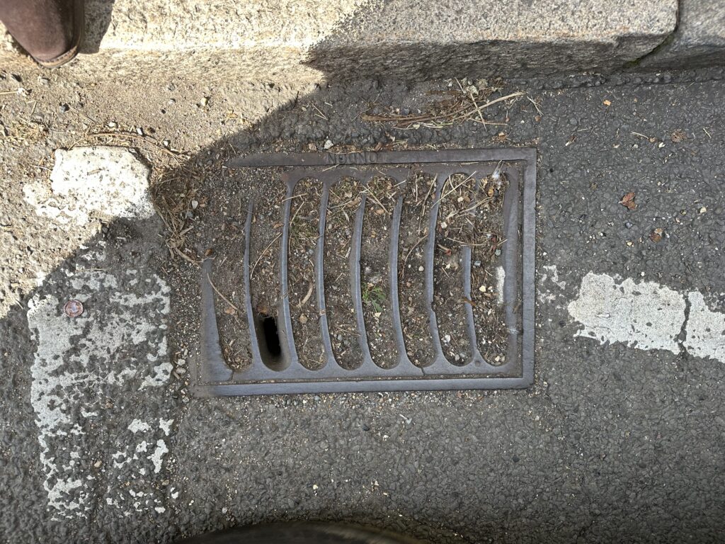The blocked drain in Station Road.