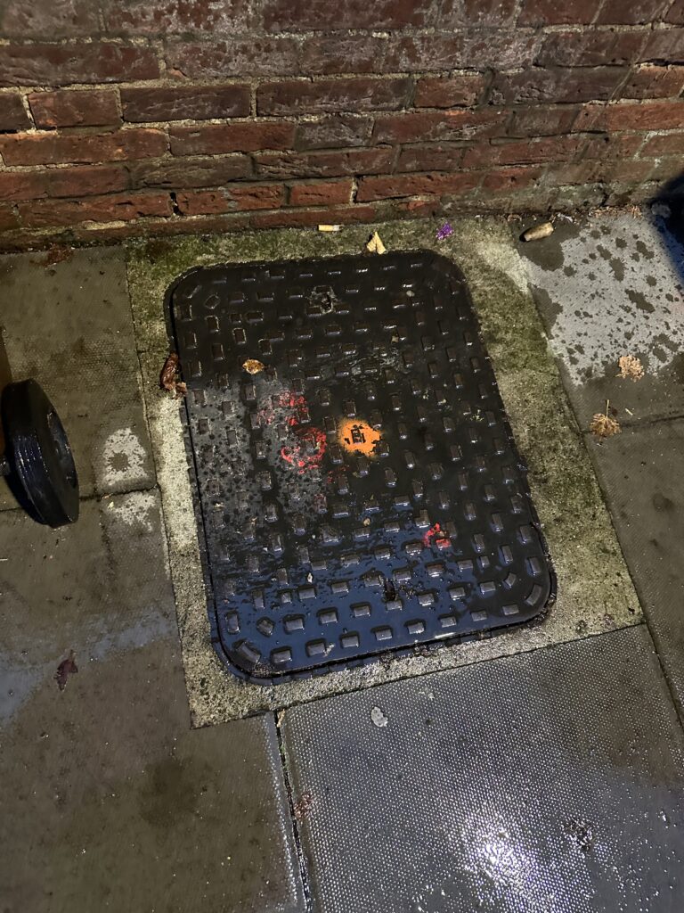 This manhole cover bursts when there is heavy rainfall.