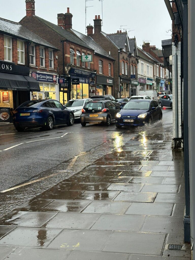 Barrie Woolston has launched a protest over flooding in Station Road, Harpenden