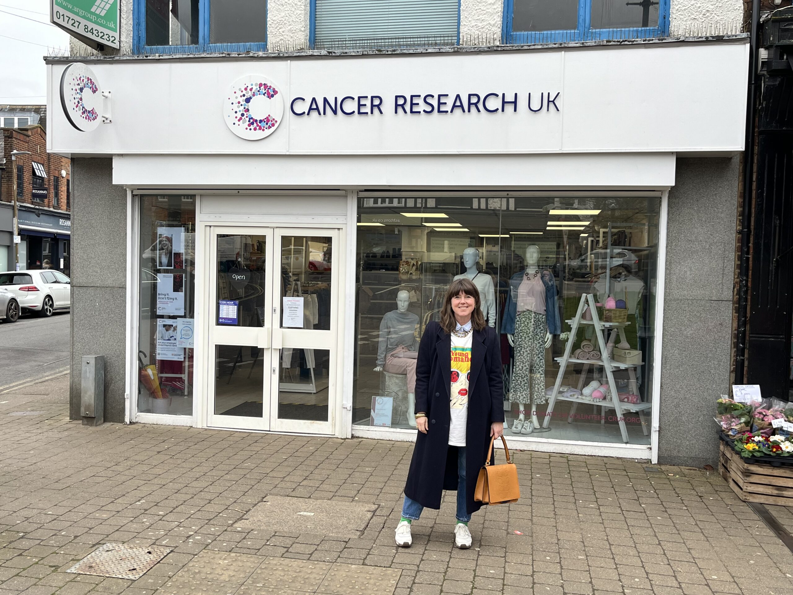 Caroline Jones outside Harpenden's Cancer Research UK charity shop.