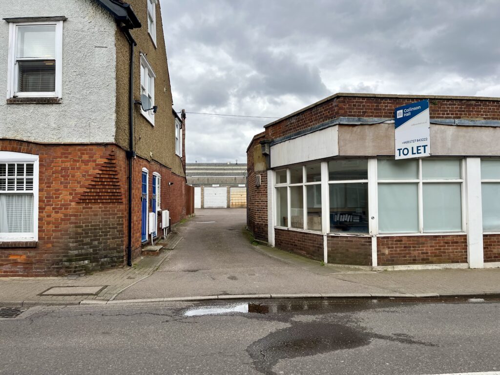 Views of the existing Coupers site in Catherine Street, which includes garages and off-street parking.