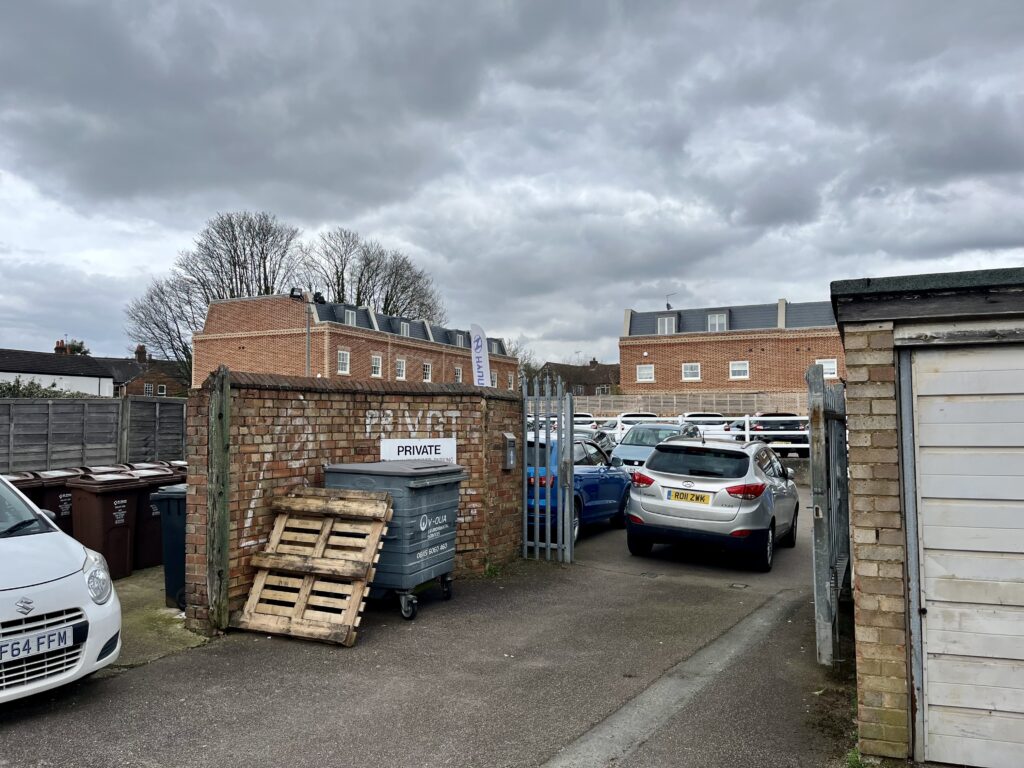 Views of the existing Coupers site in Catherine Street, which includes garages and off-street parking.