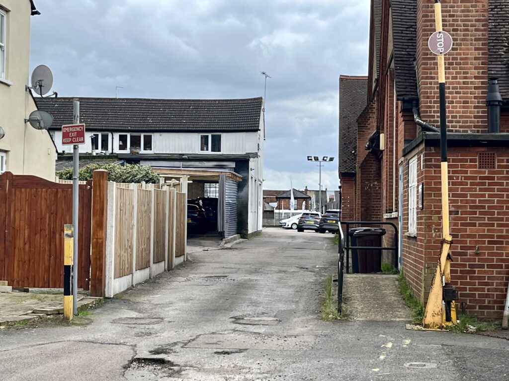 Views of the existing Coupers site in Catherine Street, which includes garages and off-street parking.