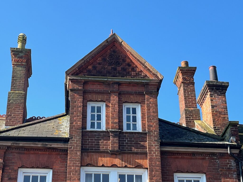 A beautifully carved gable in London Road.