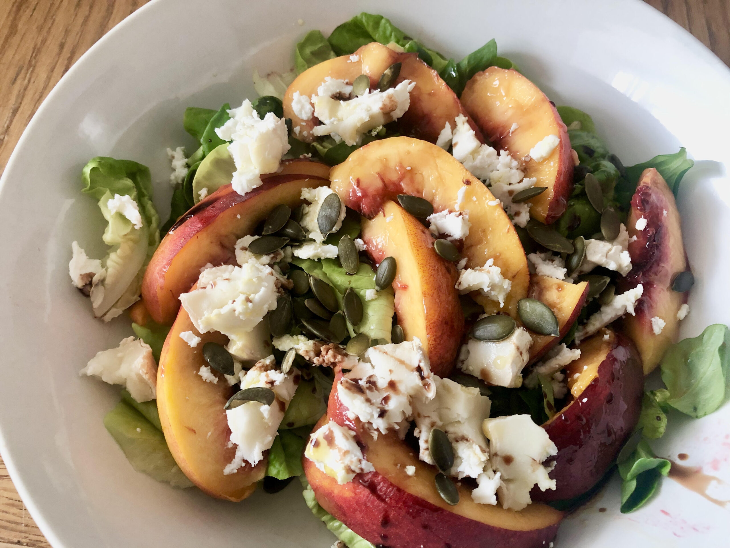 Peach and goat's cheese salad