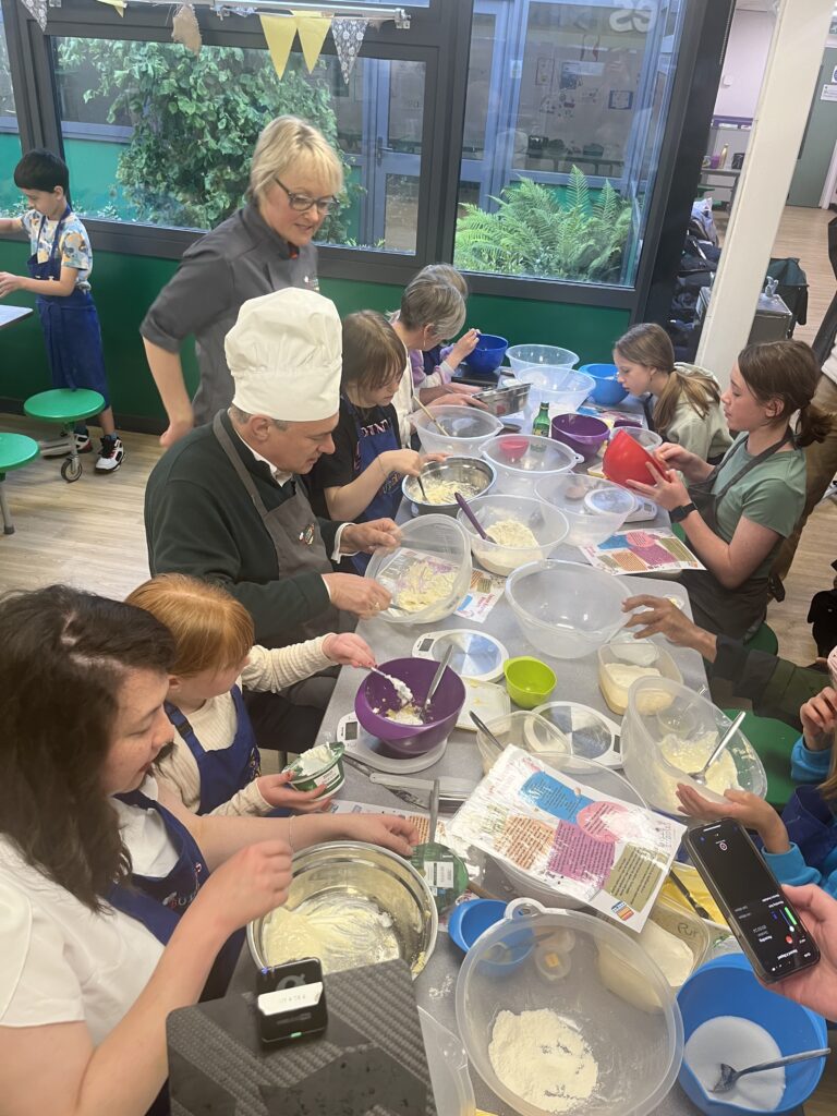 Lib Dem leader Sir Ed Davey joins Baking Buddies in Harpenden.