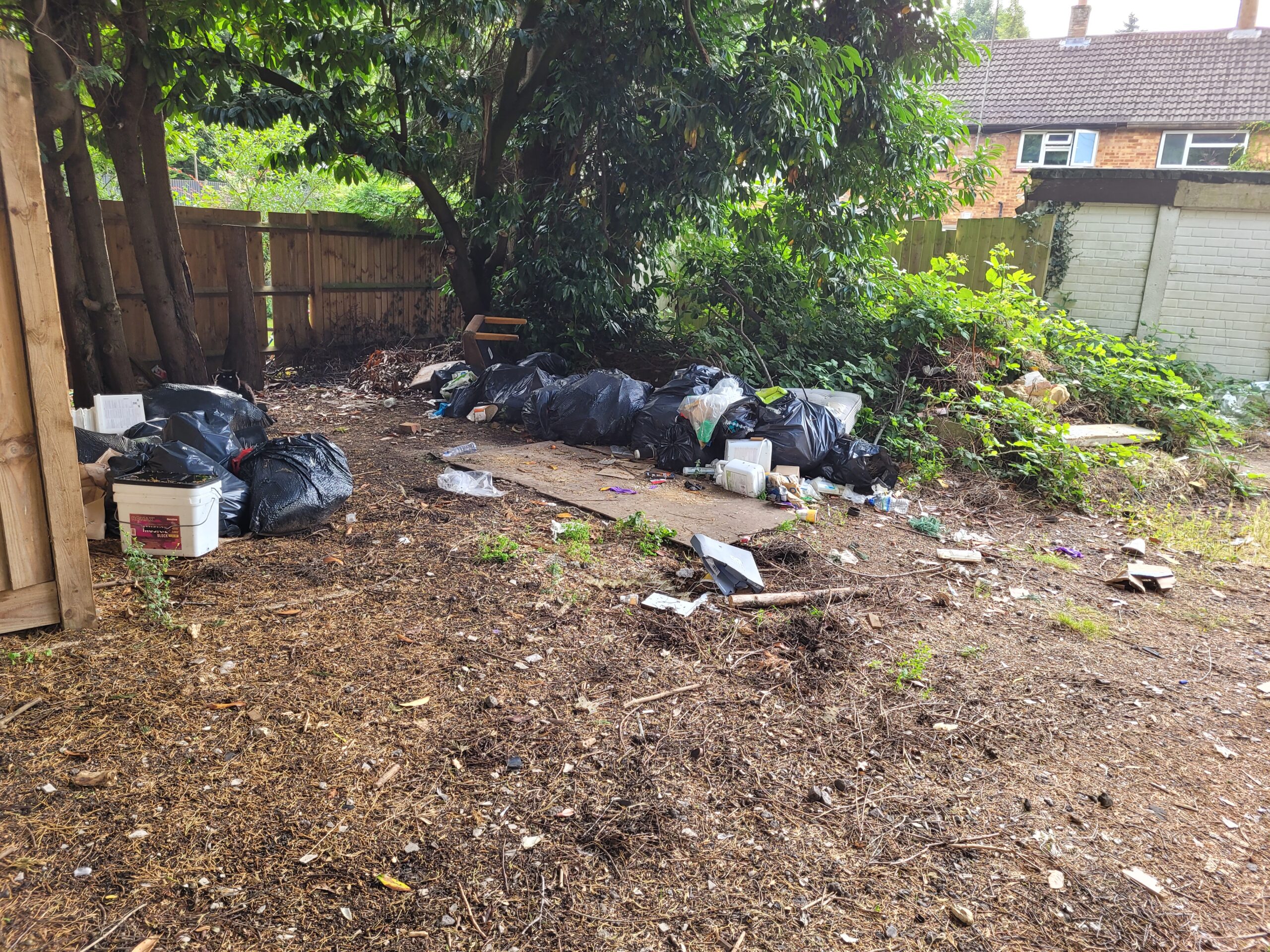 Fly-tipped rubbish at Five Acres.