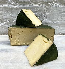 Wild garlic wrapped Yarg.