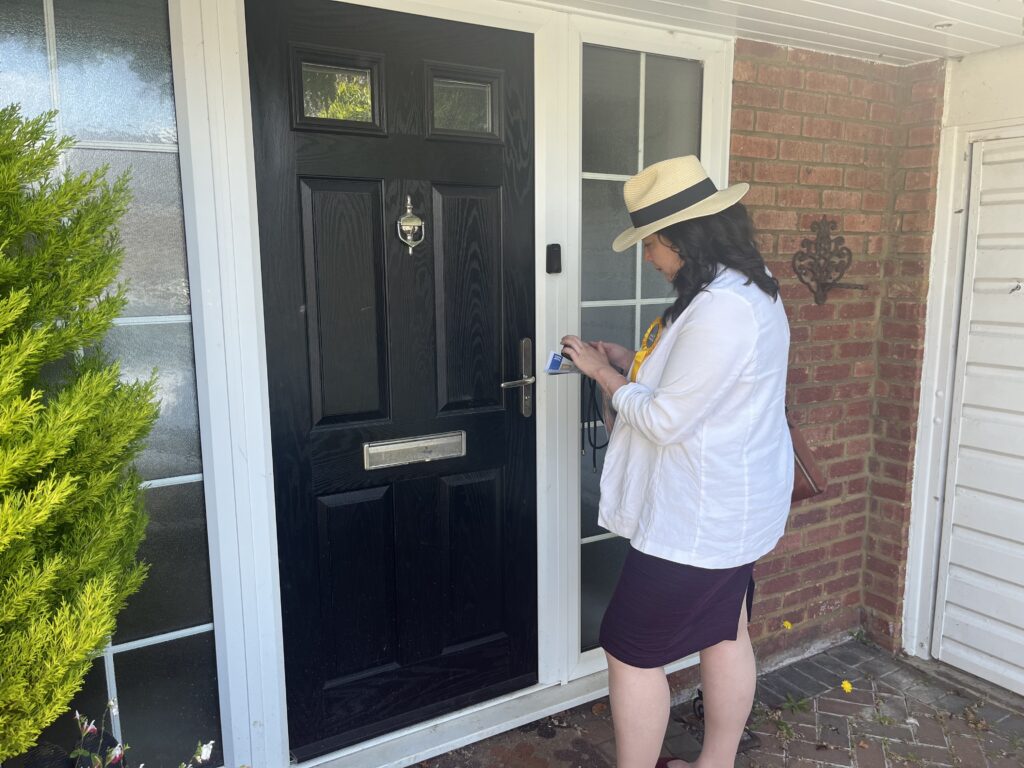 Victoria Collins knocking on doors in Harpenden.