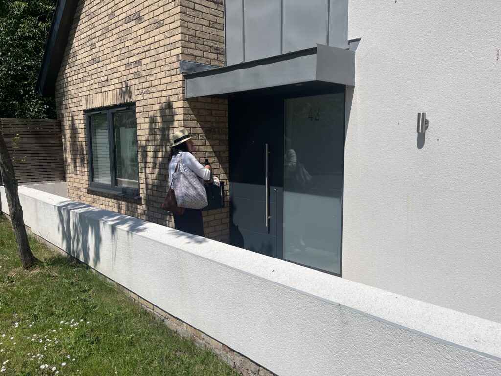 Victoria Collins knocking on doors in Harpenden.