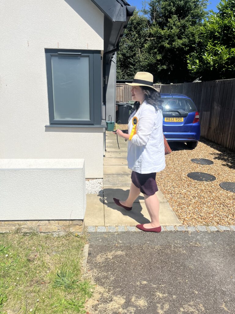 Victoria Collins knocking on doors in Harpenden.