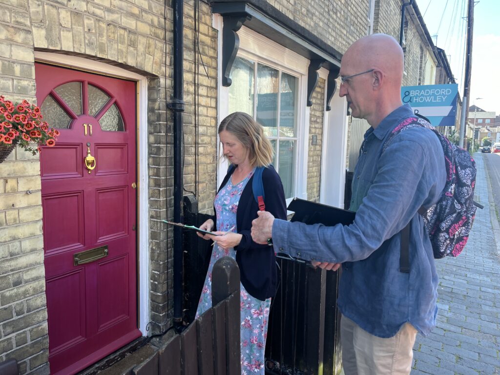 Simon Grover and Juliet Voisey out knocking on doors in St Albans.