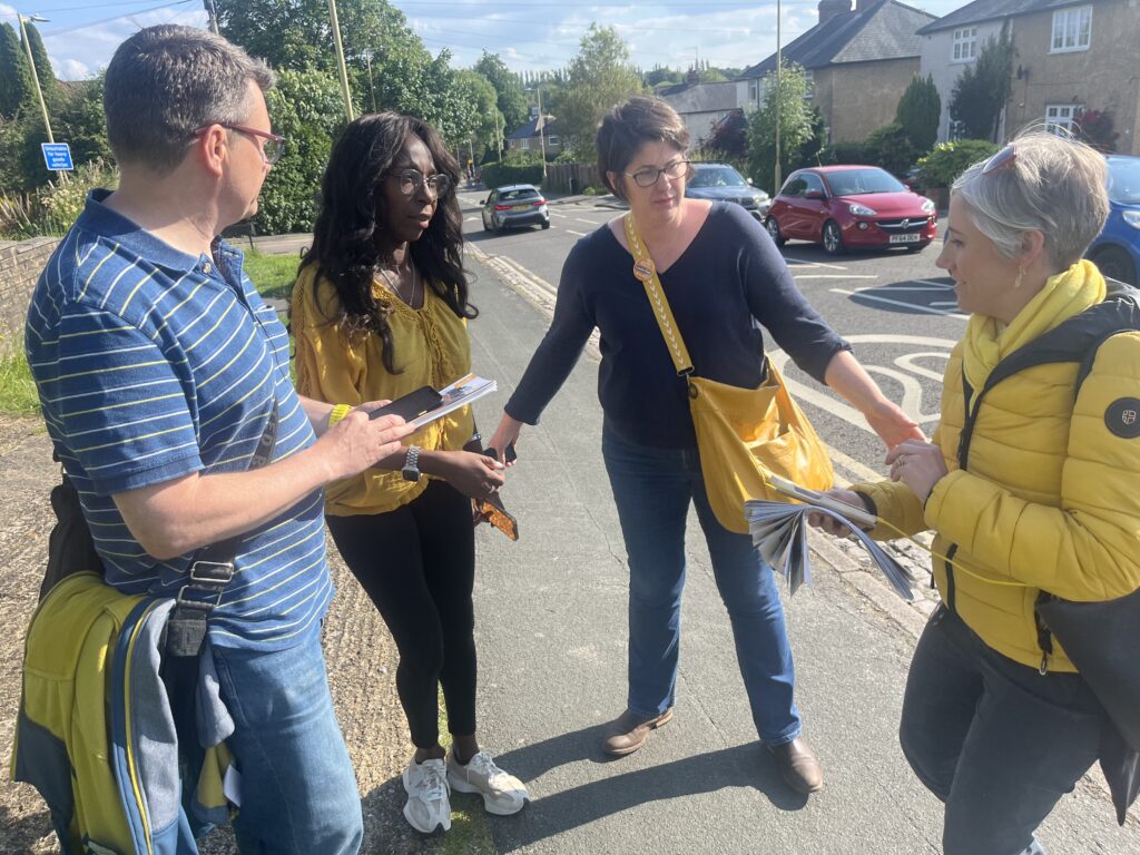 Daisy Cooper and supporters out canvassing.