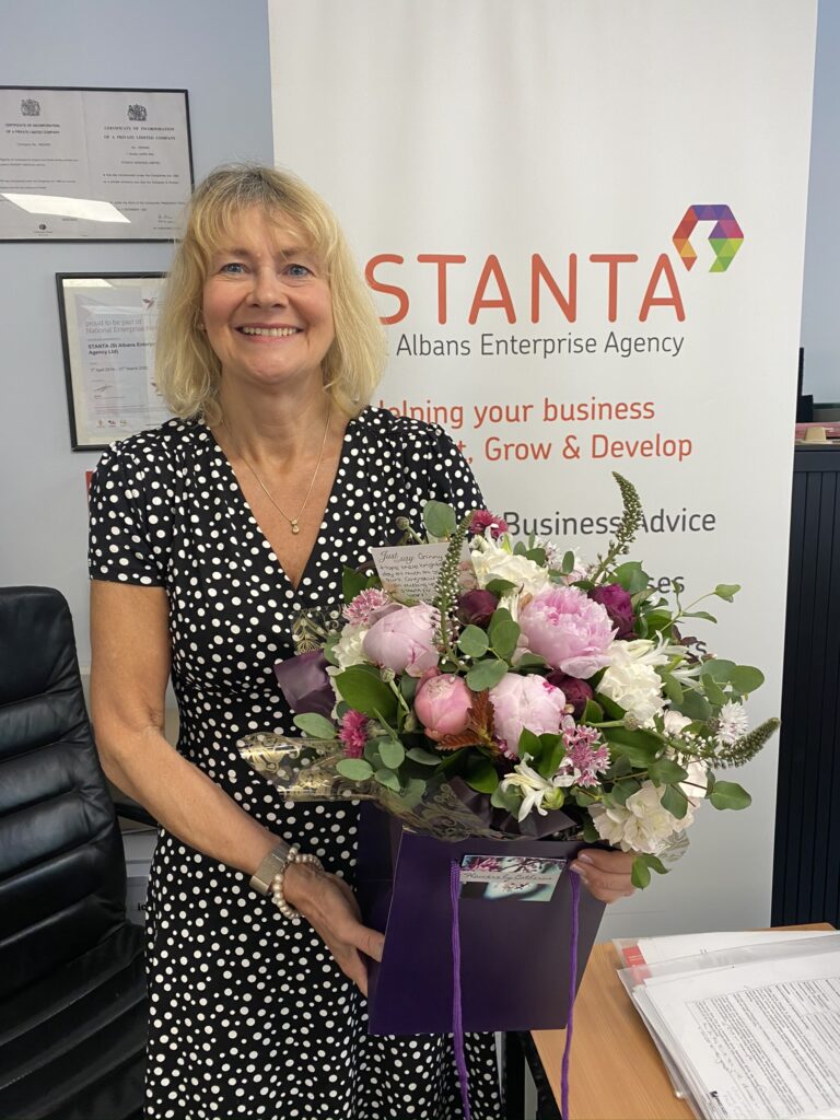 Ginny received flowers to mark her 20th anniversary with STANTA.