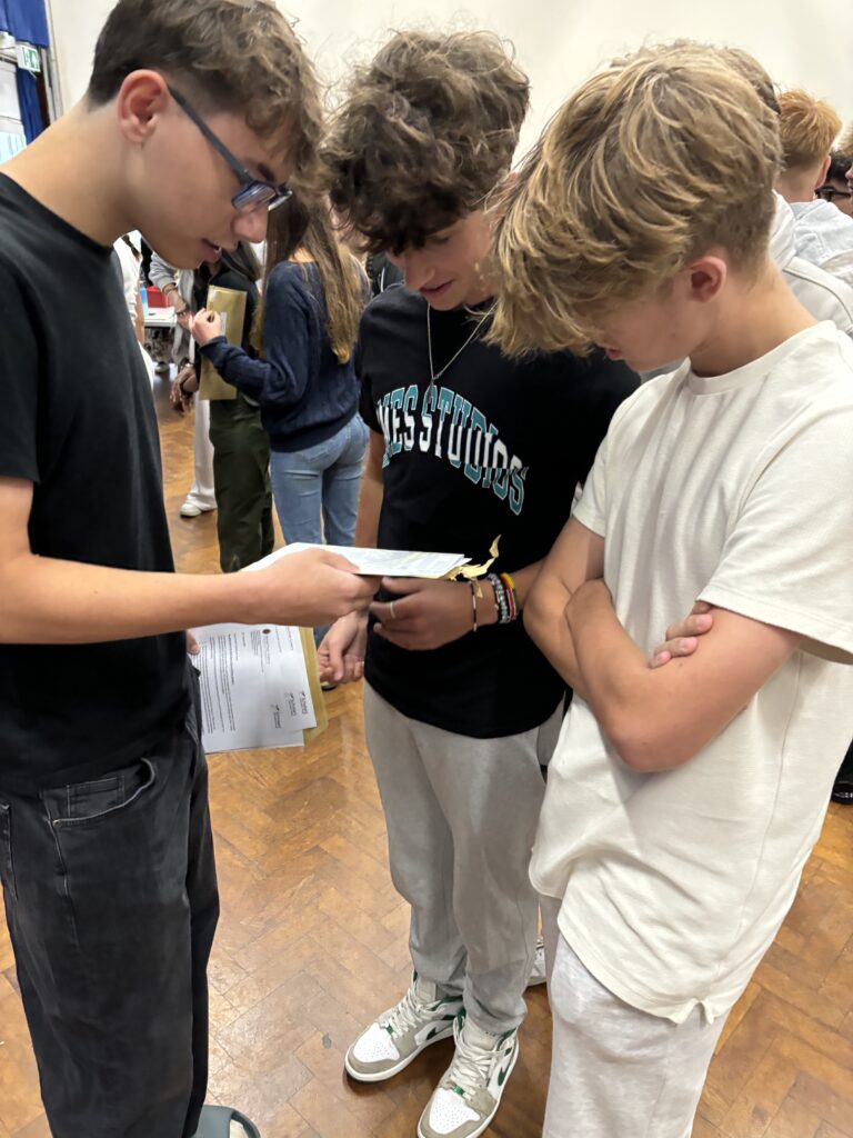 Sandringham School pupils collect their GCSE results.