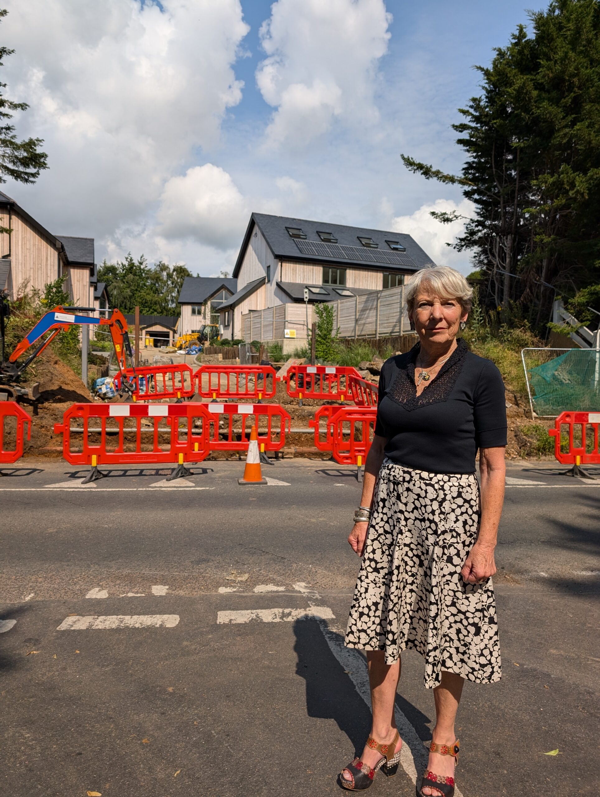 Cllr Alison Wren at the site of the Silverwood Barns housing development.