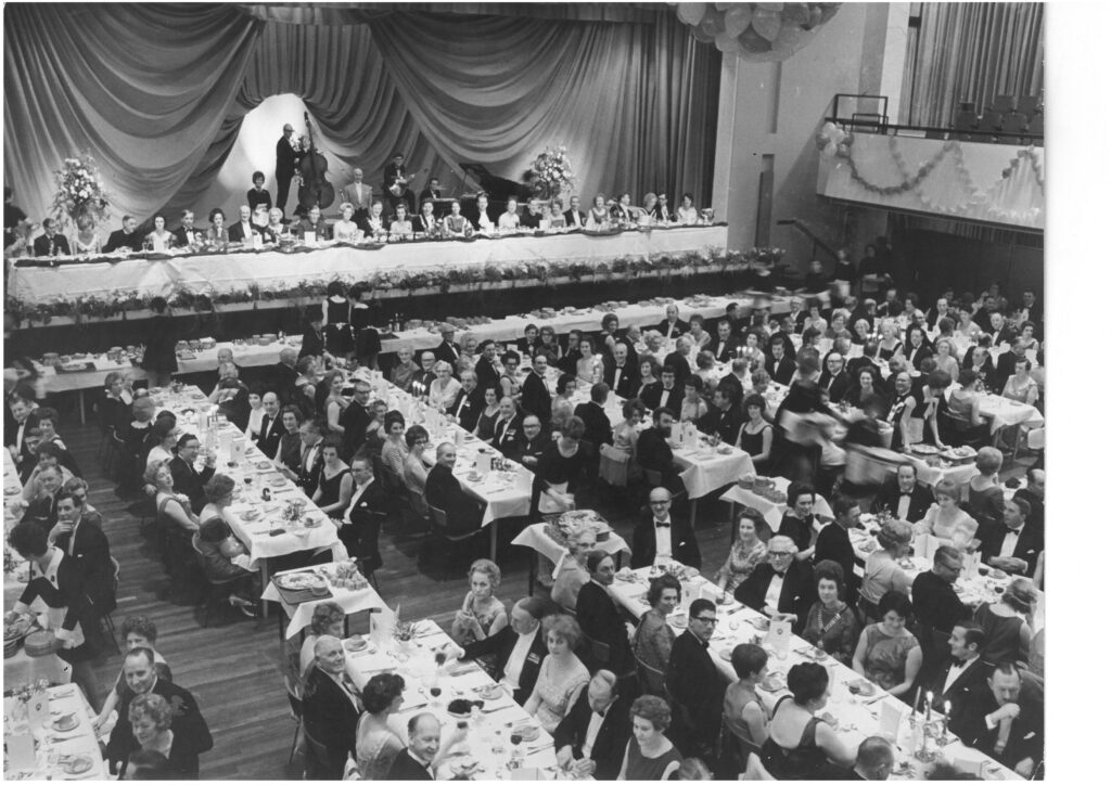A civic dinner at City Hall, where the dinner service would have been used.