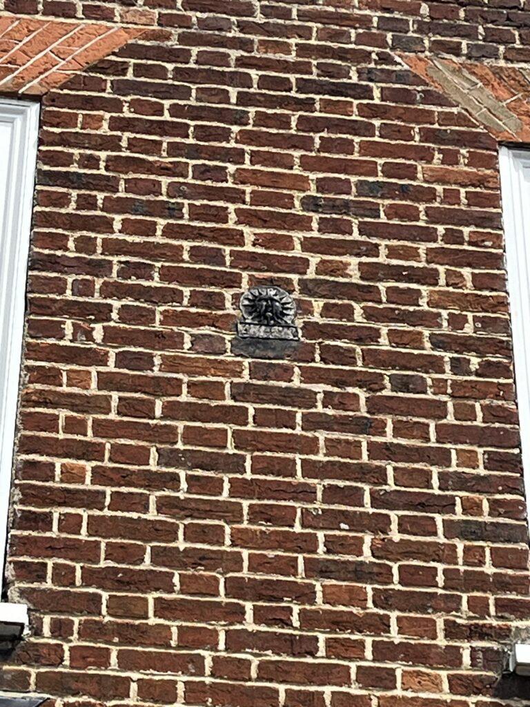 Fire insurance plaque in Fishpool Street.