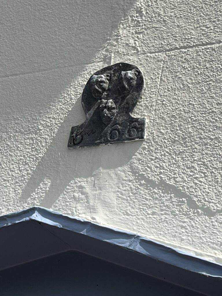 Fire insurance plaque in Fishpool Street.