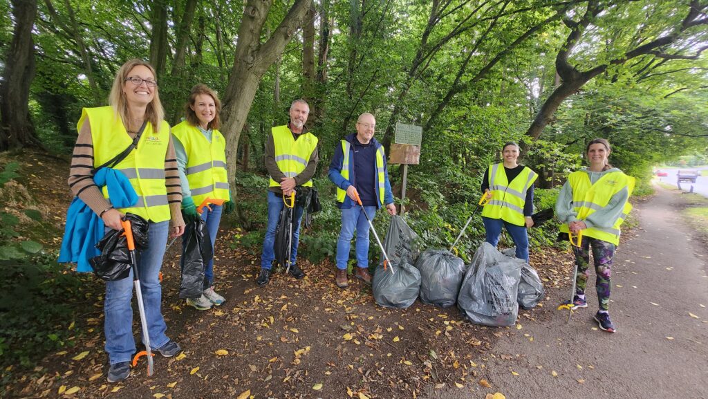 Business volunteers clearing rubbish from Beech Bottom Dyke.