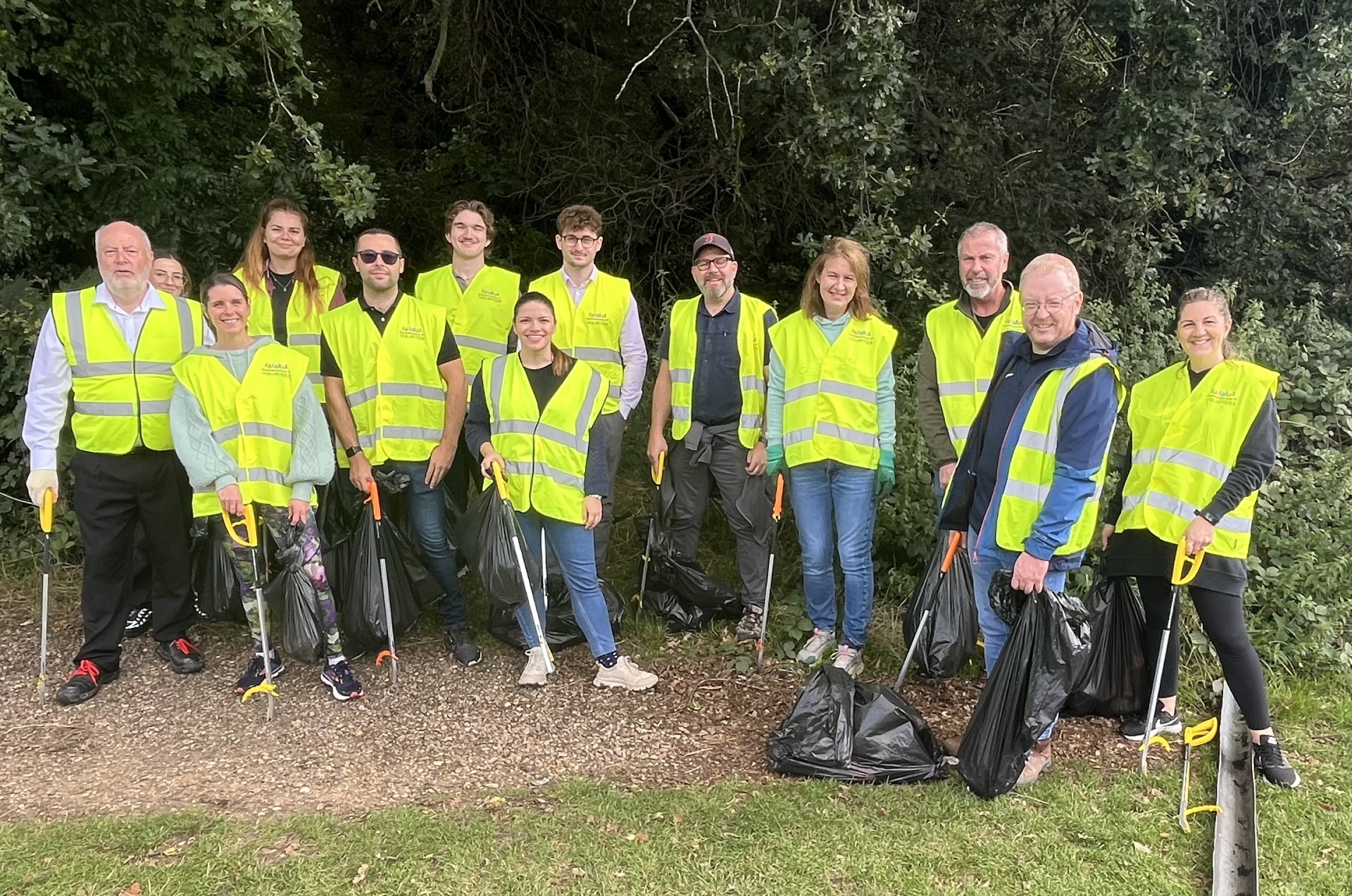 Business volunteers clearing rubbish from Beech Bottom Dyke.