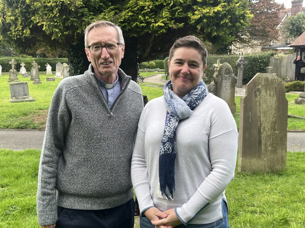 Local minister Peter Crumpler and cemeteries superintendent Kate Mercer.