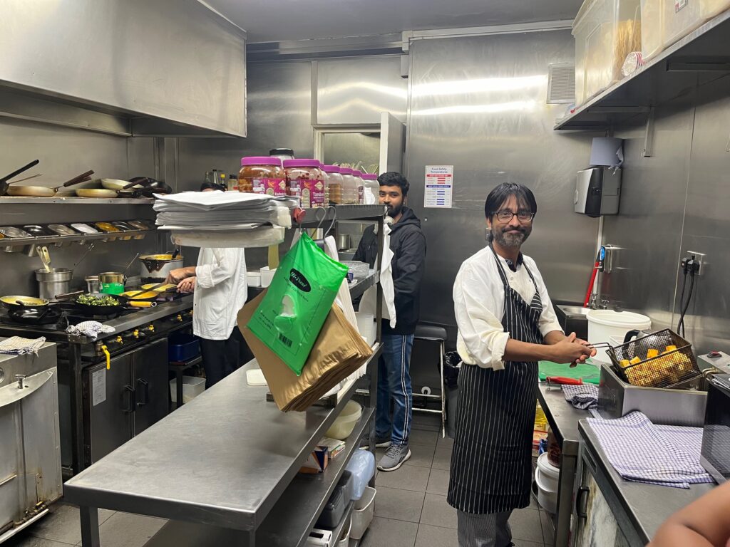In the kitchen at Touch of Spice.