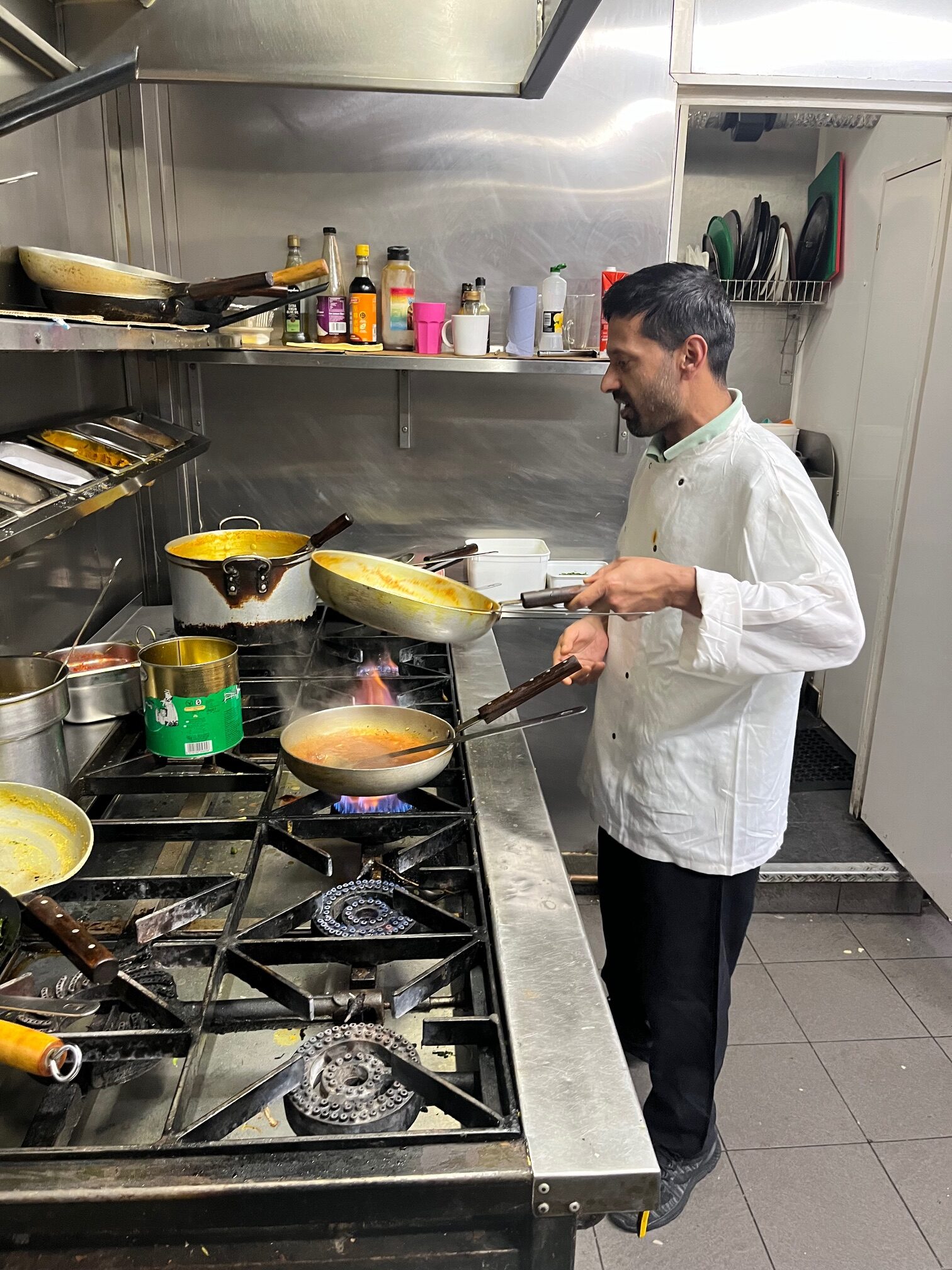 In the kitchen at Touch of Spice.