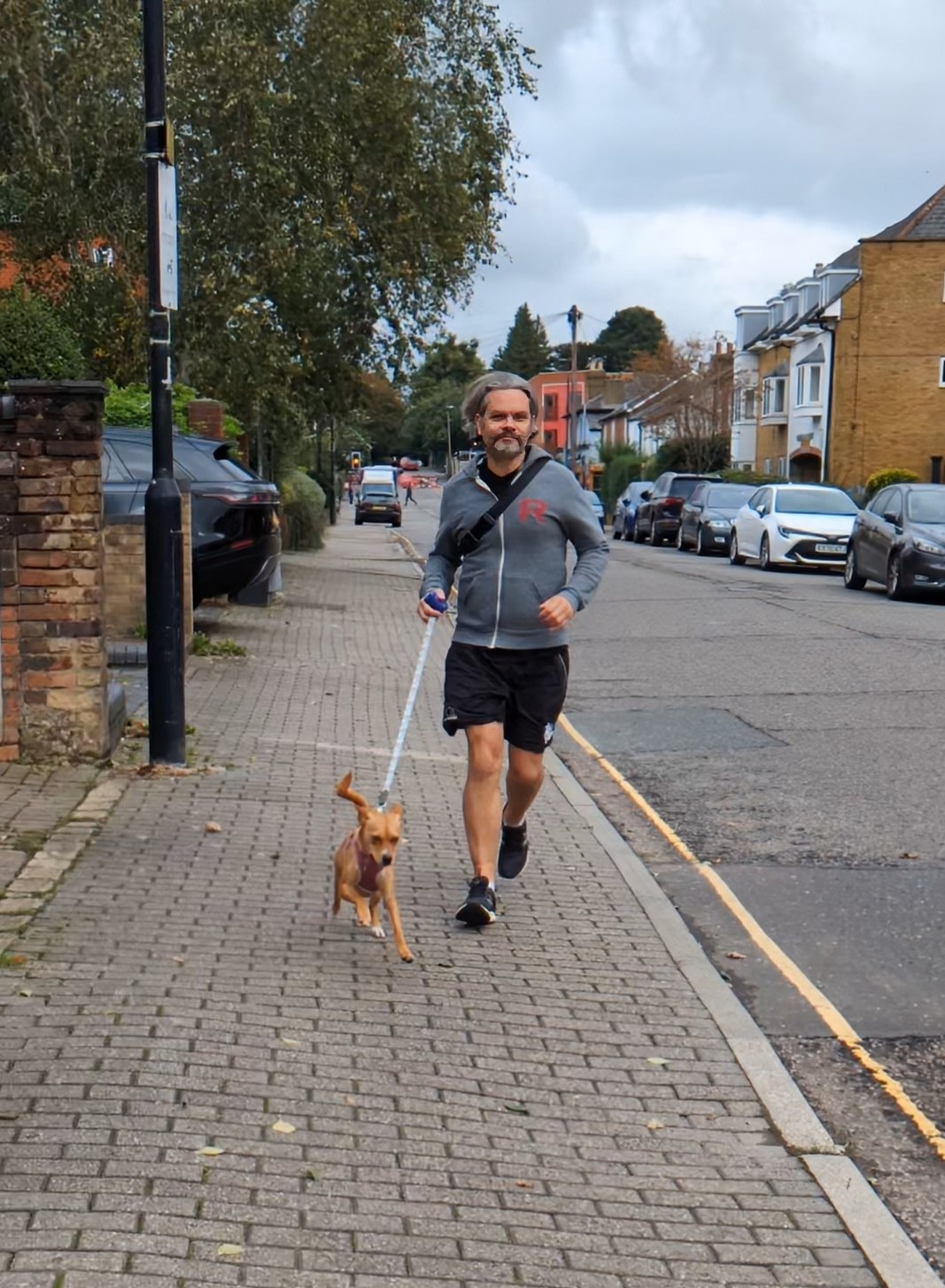 Matt and Daphne the dog in training for the Herts 10K.