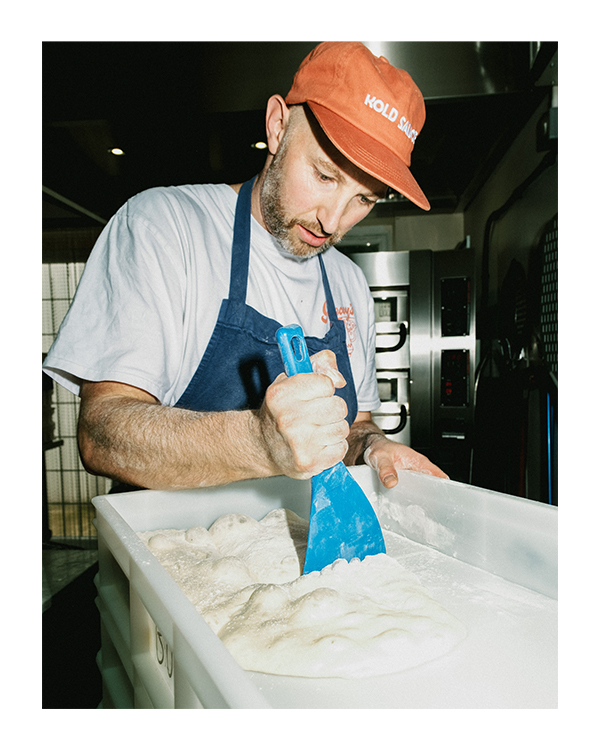 James making pizza.